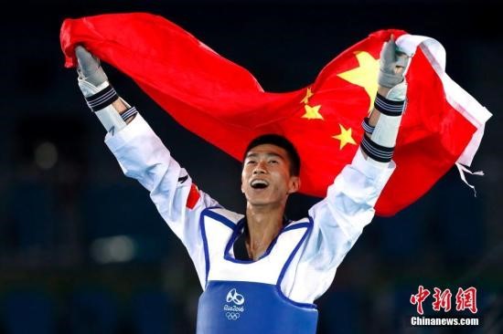 五星紅旗亞運村迎風(fēng)飛揚，紐恩泰國際發(fā)展揚帆啟航